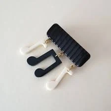 Bow & Crossbones Laverne Music Notes Brooch - Black & White